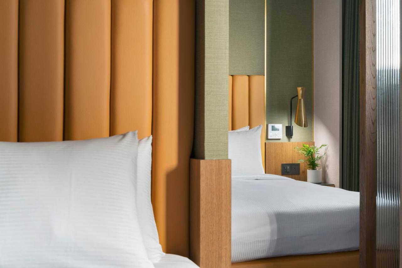 Kindness Day Hotel Тайнан Стая снимка